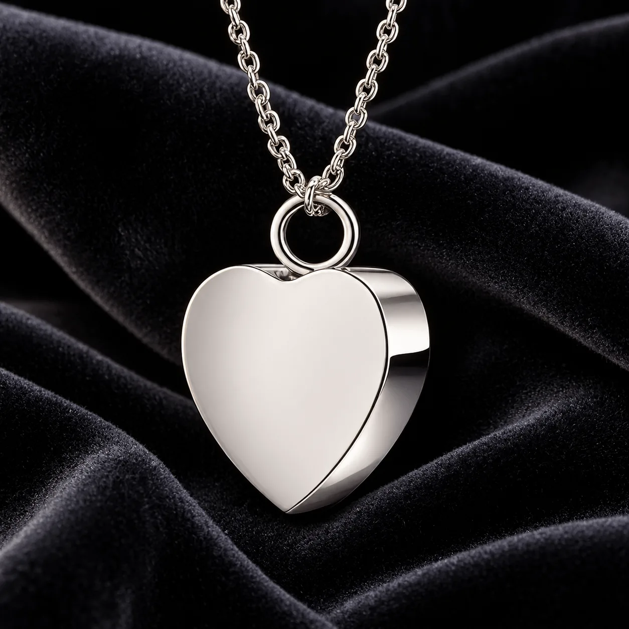 Polished stainless steel heart ash pendant for pet ashes on a chain